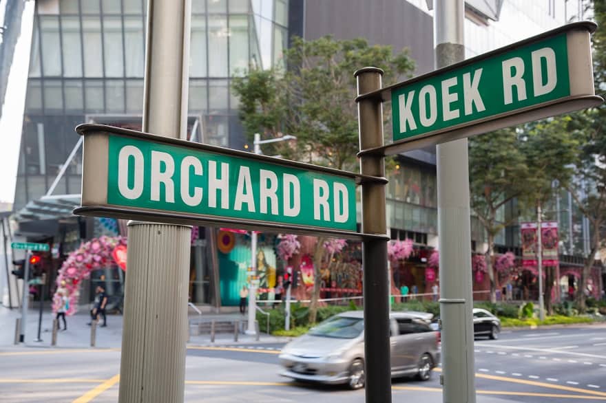 Moving to Singapore - Street signs Orchard Road and Koek Road in Singapore